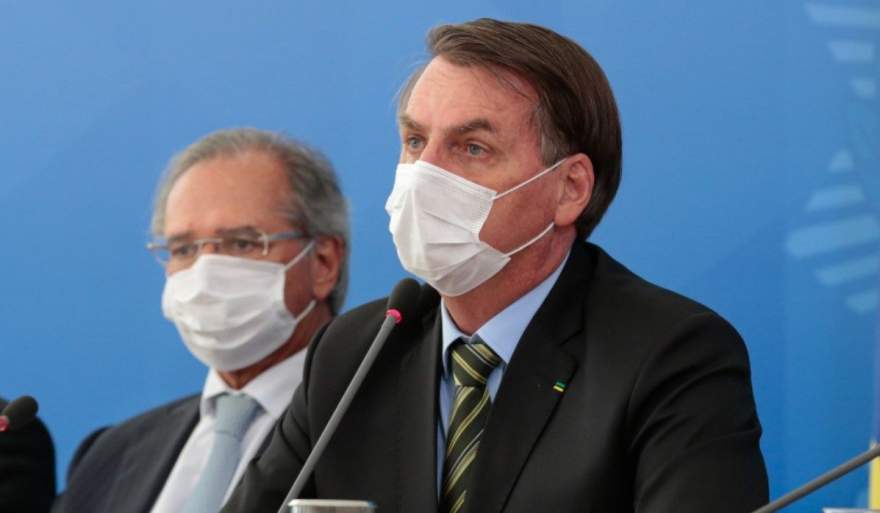 Presidente Jair Bolsonaro, ao lado do ministro de Economia, Paulo Guedes
