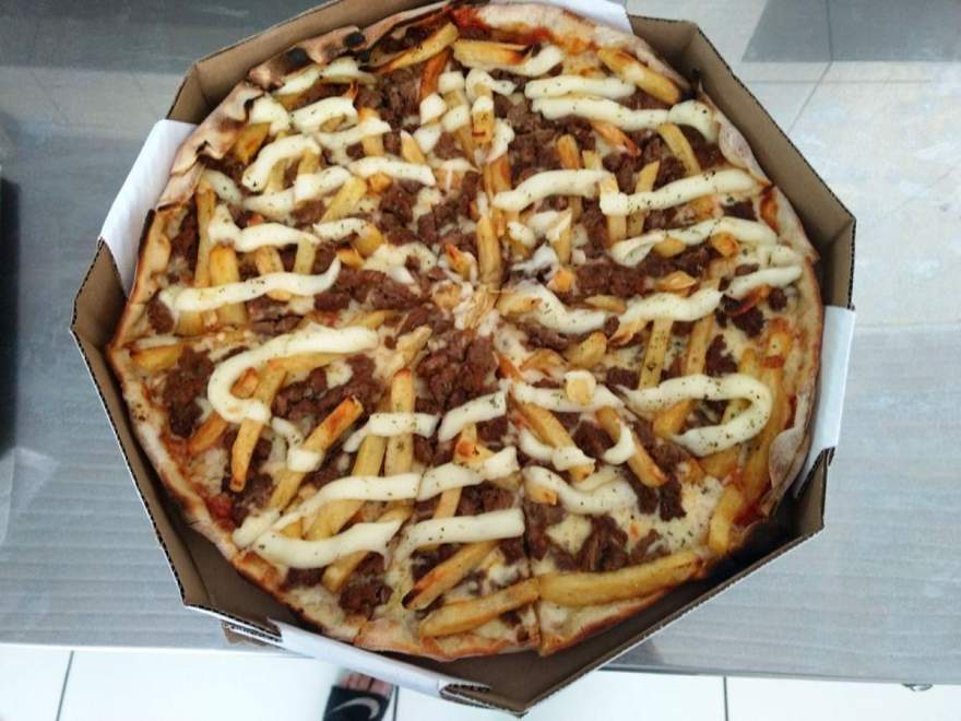 Novidade: pizza de filé com fritas
