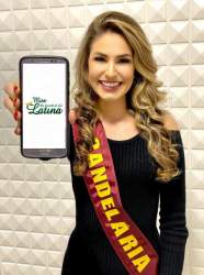 A alegria da Miss Latina Candelária