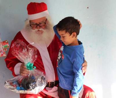 Carismático com as crianças, Seu Arlindo representava como poucos a figura do Bom Velhinho 
